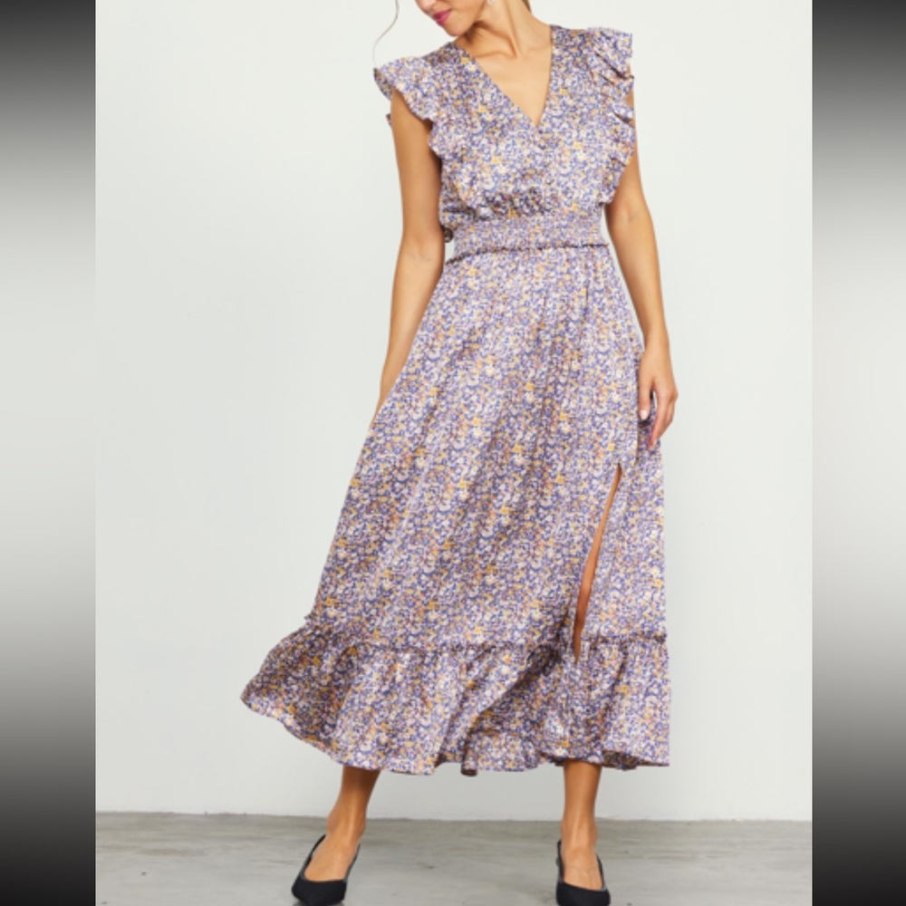 New with tags. Floral dress. Skies are Blue